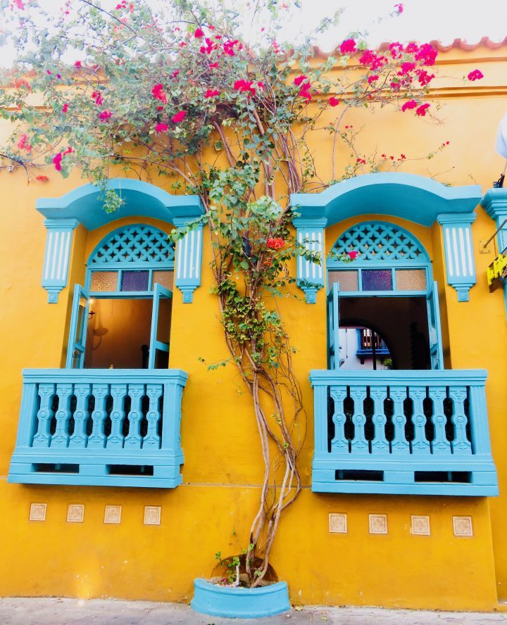 Colorful streets with flowers in Cartagena Colombia; Colombia Travel Blog Inspirations