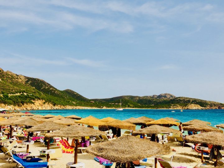 Cala Tuerredda umbrellas in South Sardinia, Sardinia Travel Blog Inspirations