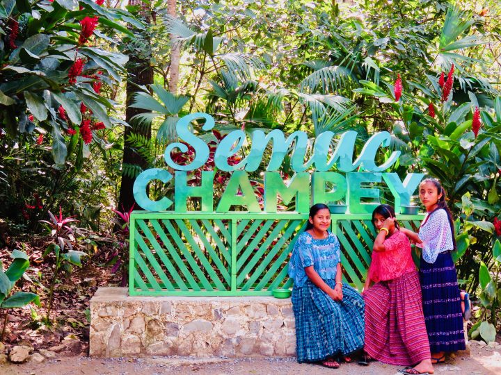 Girls at sign Semuc Champey Guatemala, Guatemala Travel Blog