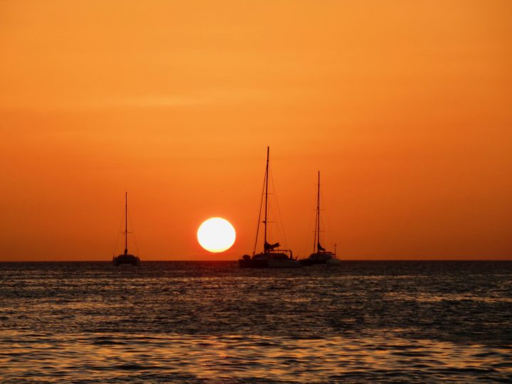 Sunset and sailing boats at the split on Caye Caulker Belize, Belize Travel Blog