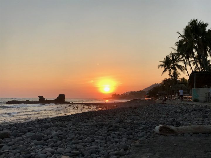 Sunset over the rocks in El Tunco El Salvador, El Salvador Travel Blog