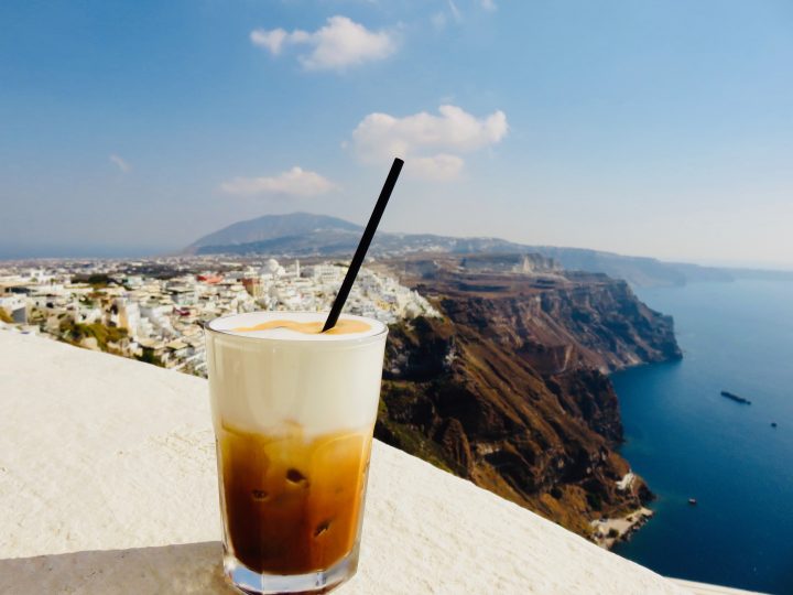 Restaurant bar Volkan drinking Freddo on Santorini Greece, Greek Cyclades travel Blog