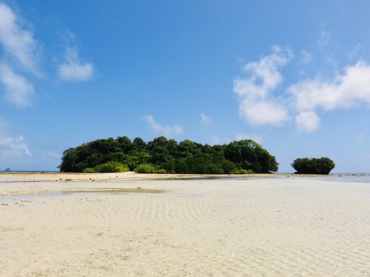 Walking with low tide to Janoyoy Island Surfing Siargao Philippines Travel Blog