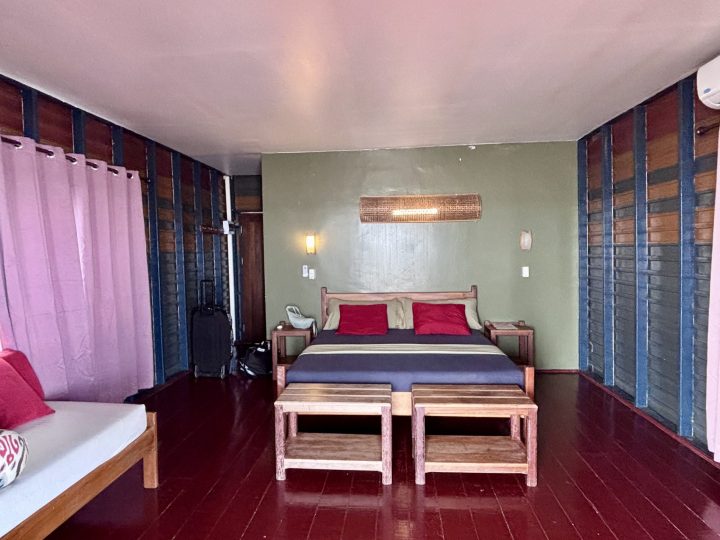 Interior of an overwater bungalow at Akira Bigi Pan Resort