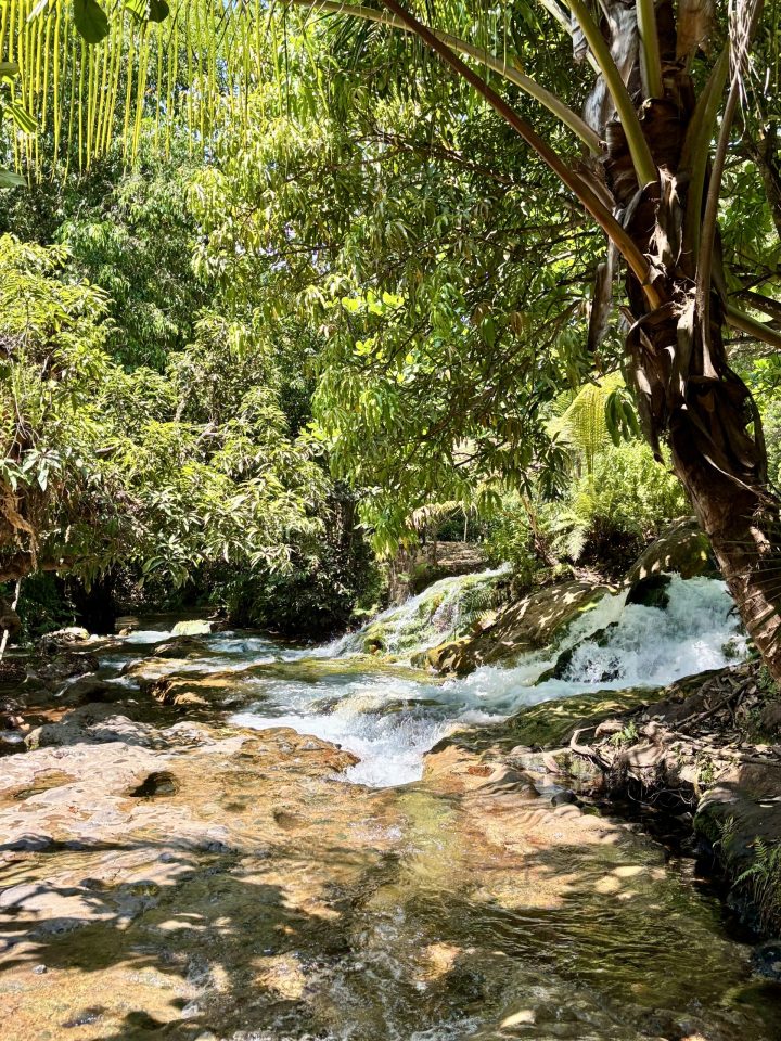 Bathing in the river at Soa Mengeruda Hot Spring