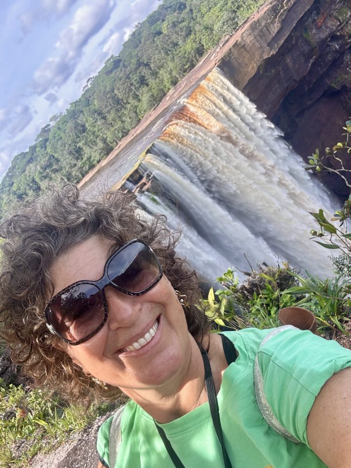 Selfie holding a tree near Kaieteur Falls viewpoint in Guyana