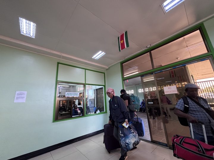 Waiting for passport at immigration during the Nickerie crossing