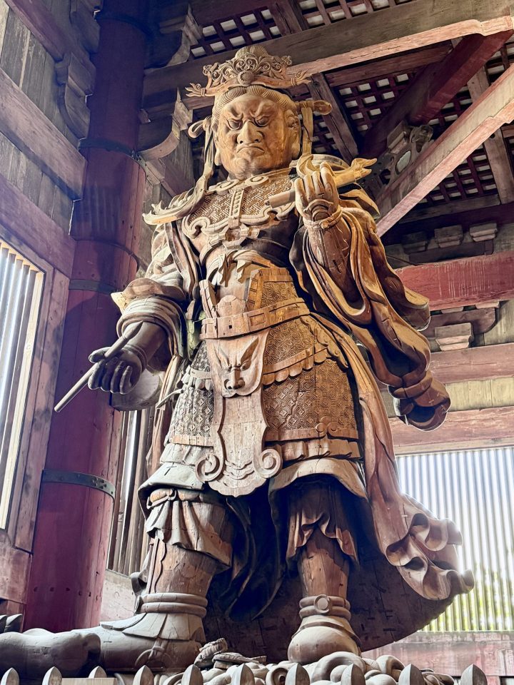 Guardian statue inside the Great Buddha Hall in Nara
