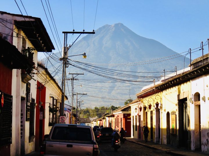 Agua Volcano behind a colorful street in Antigua Guatemala
