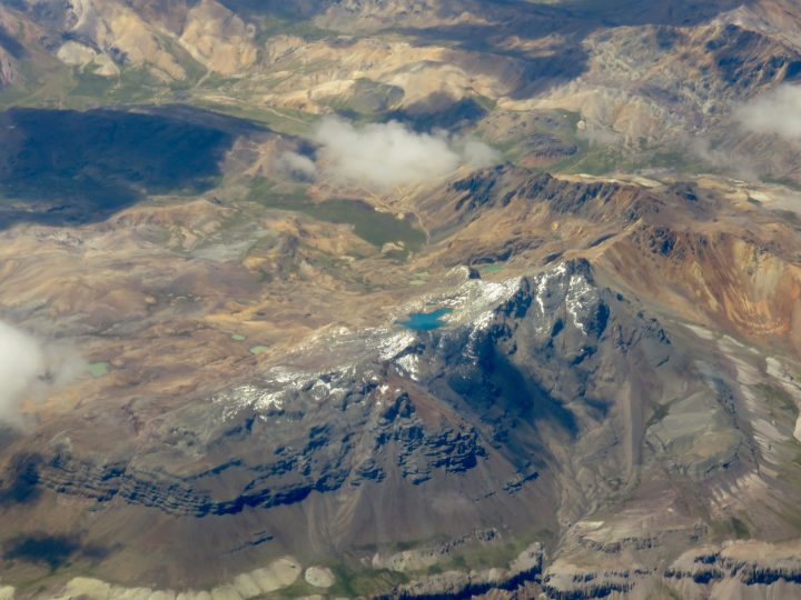 Aerial view over the Andes mountains during a flight to Lima Peru