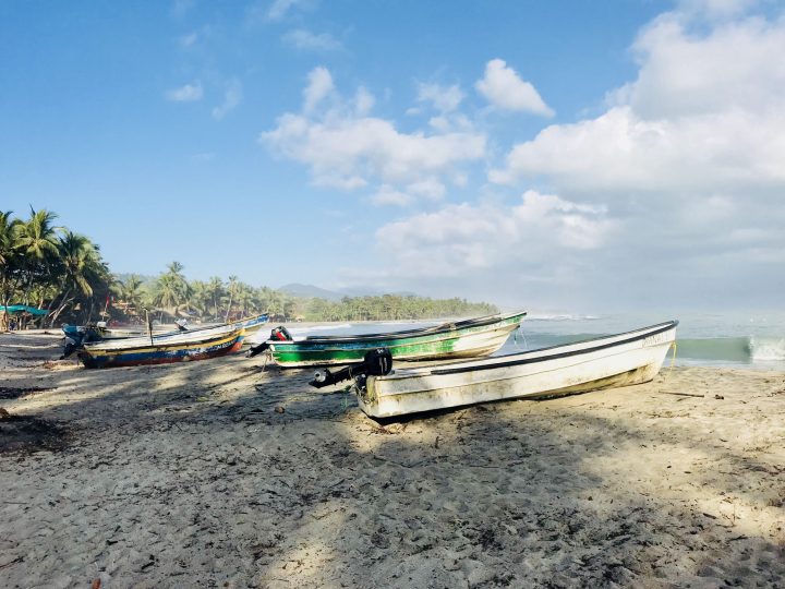Fishing boats on Costeño Beach near Tayrona Colombia