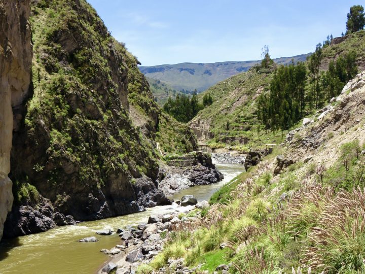 River and green mountain landscape near the hot springs in Colca Canyon Peru