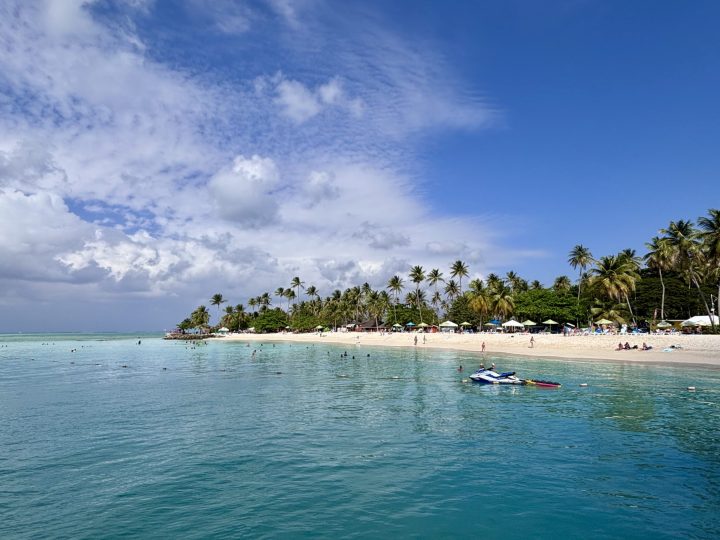 Pigeon Point Beach with turquoise water and palm trees in Tobago