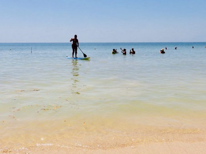 Stand-up paddleboarding at Isla del Encanto in the Rosario Islands near Cartagena